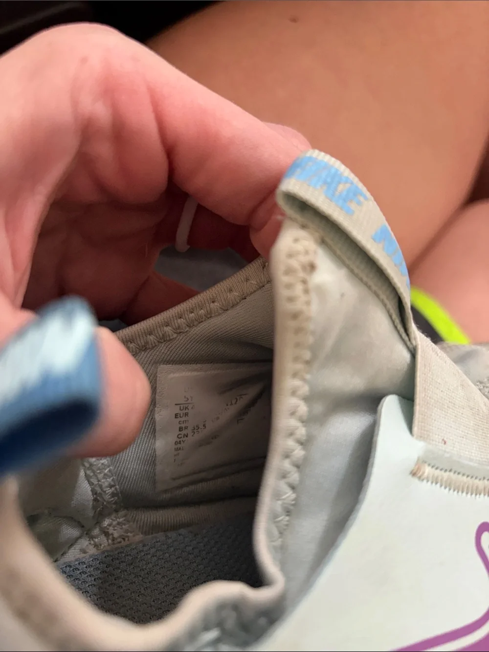 Nike Kids Mint Green Slip-On Sneakers with Purple Swoosh